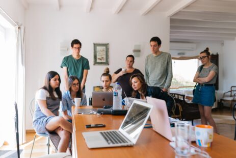 group of people watching on laptop 1595385 scaled 1